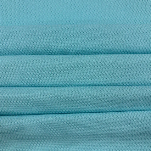 Close-up of blue textured knit fabric, style XN26175